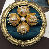 Broche Aurora